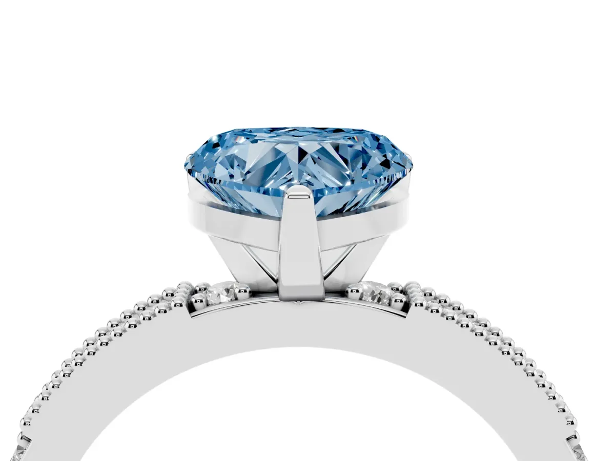 Fancy Blue Heart Cut Solitaire with Pavé Band and Four-Prong Setting Silver