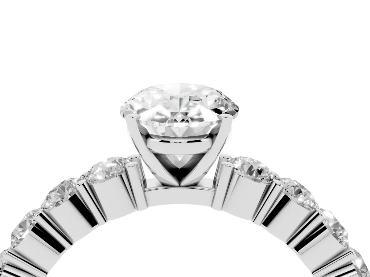 Oval Cut Diamond Solitaire Ring with Shared Prong Round Side Stones Silver