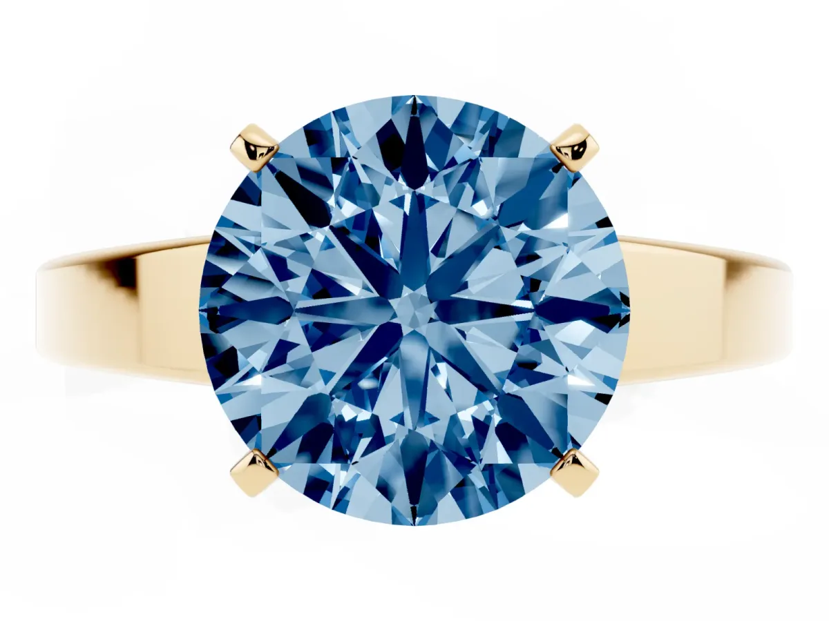 Fancy Blue Round Cut Solitaire Engagement Ring with Four-Prong Setting and Tapered Band Yellow gold