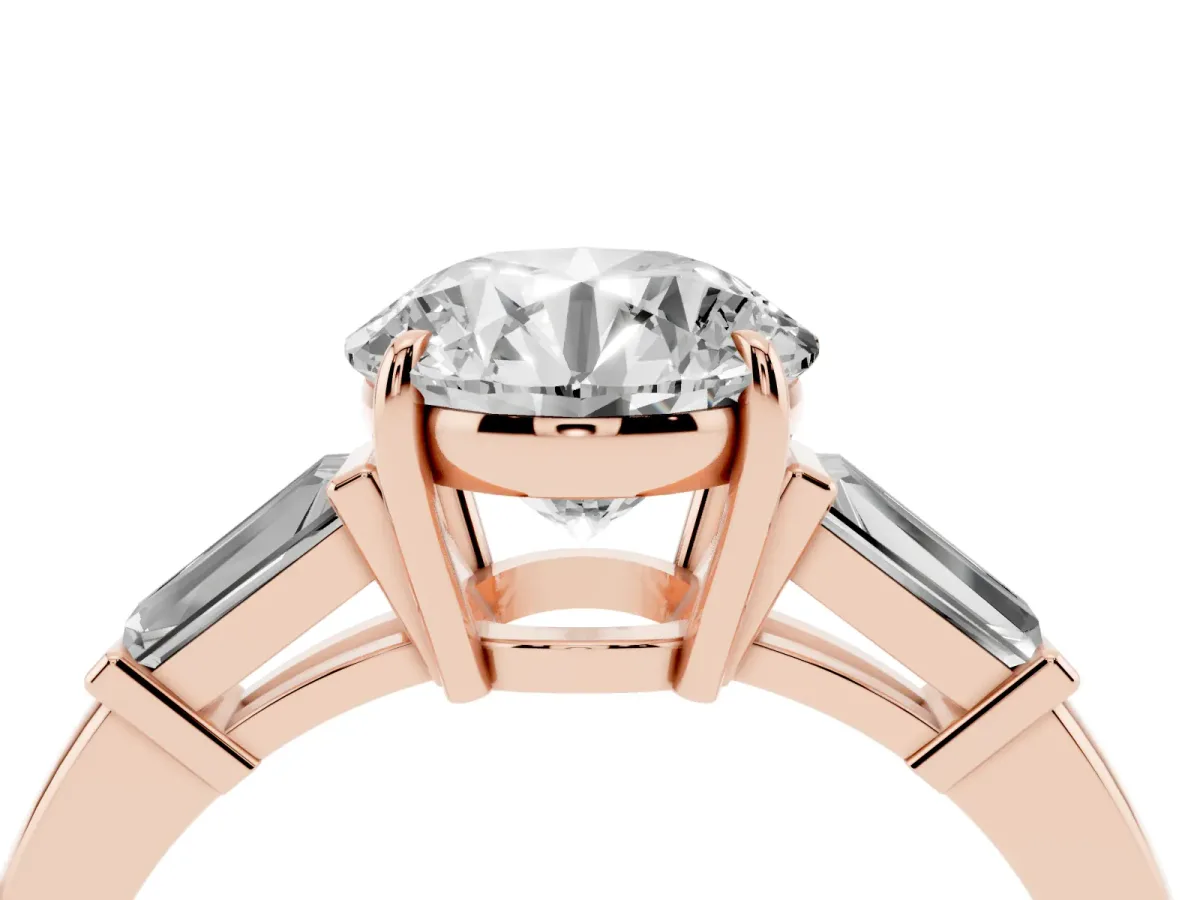 Round Cut Diamond Three-Stone Ring with Tapered Baguette Side Stones and Prong Setting Rose gold