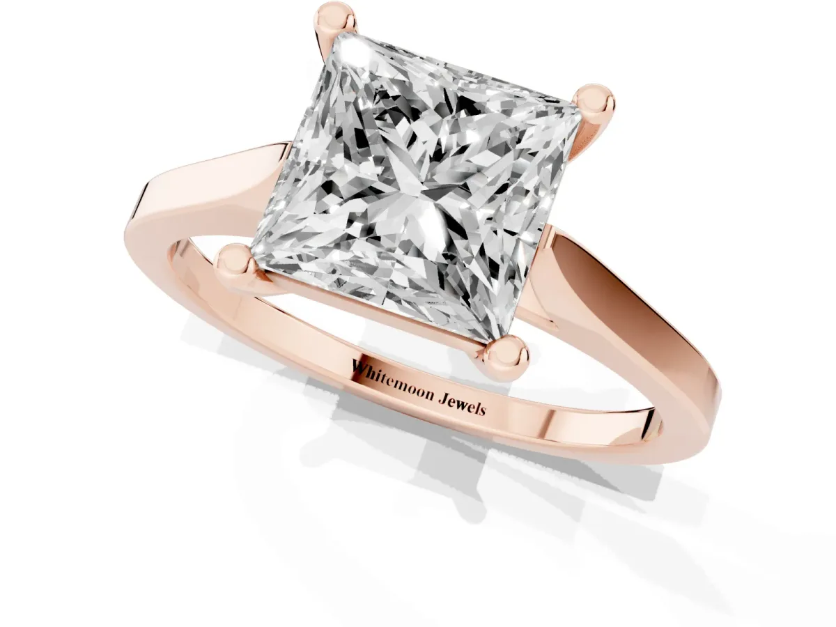 Princess Cut Solitaire Diamond Ring with Four-Prong Setting and Tapered Band Rose gold