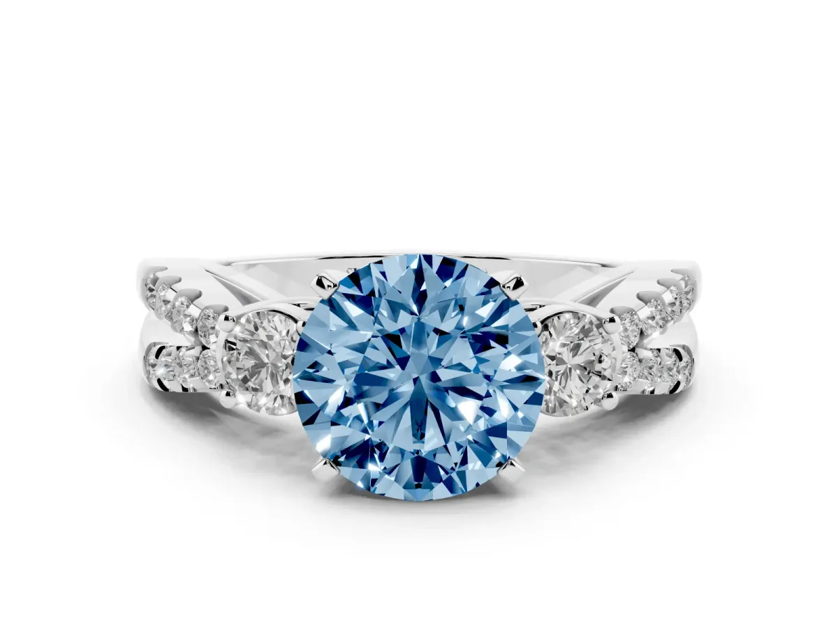 Fancy Blue Round Cut Diamond Three-Stone Ring with Pavé Split Shank and Four-Prong Setting White gold