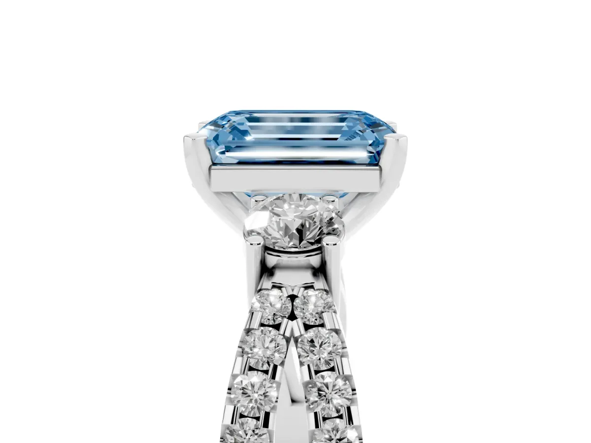 Fancy Blue Emerald Cut Diamond Three-Stone Ring with Pavé Split Shank and Four-Prong Setting Silver