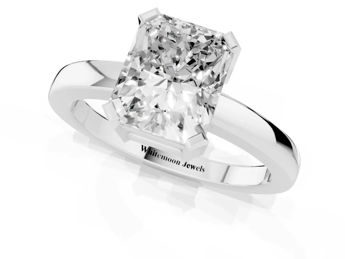 Radiant Cut Cut Solitaire Ring with Four-Prong Setting and Classic Band Silver