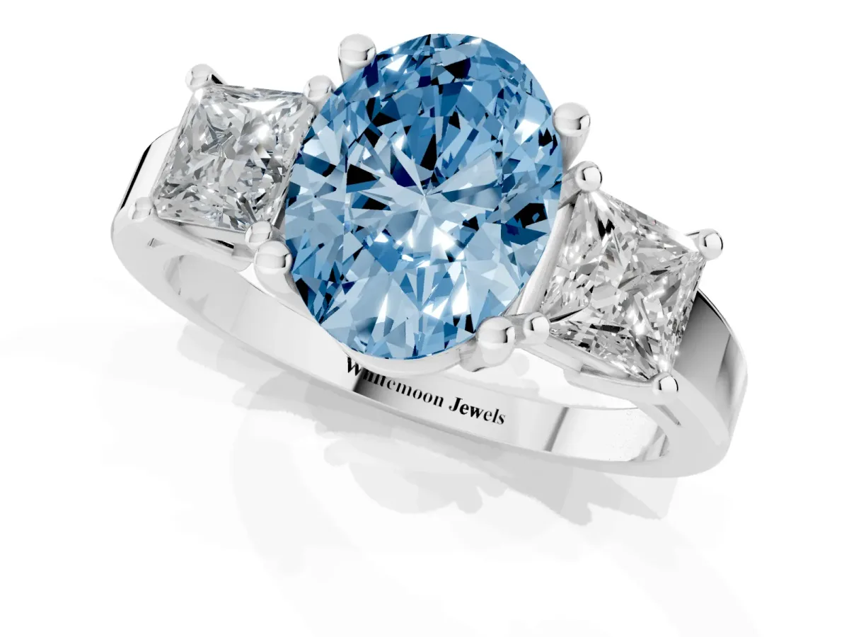 Fancy Blue Three-Stone Oval Cut Cut Solitaire Ring with Prong Setting White gold