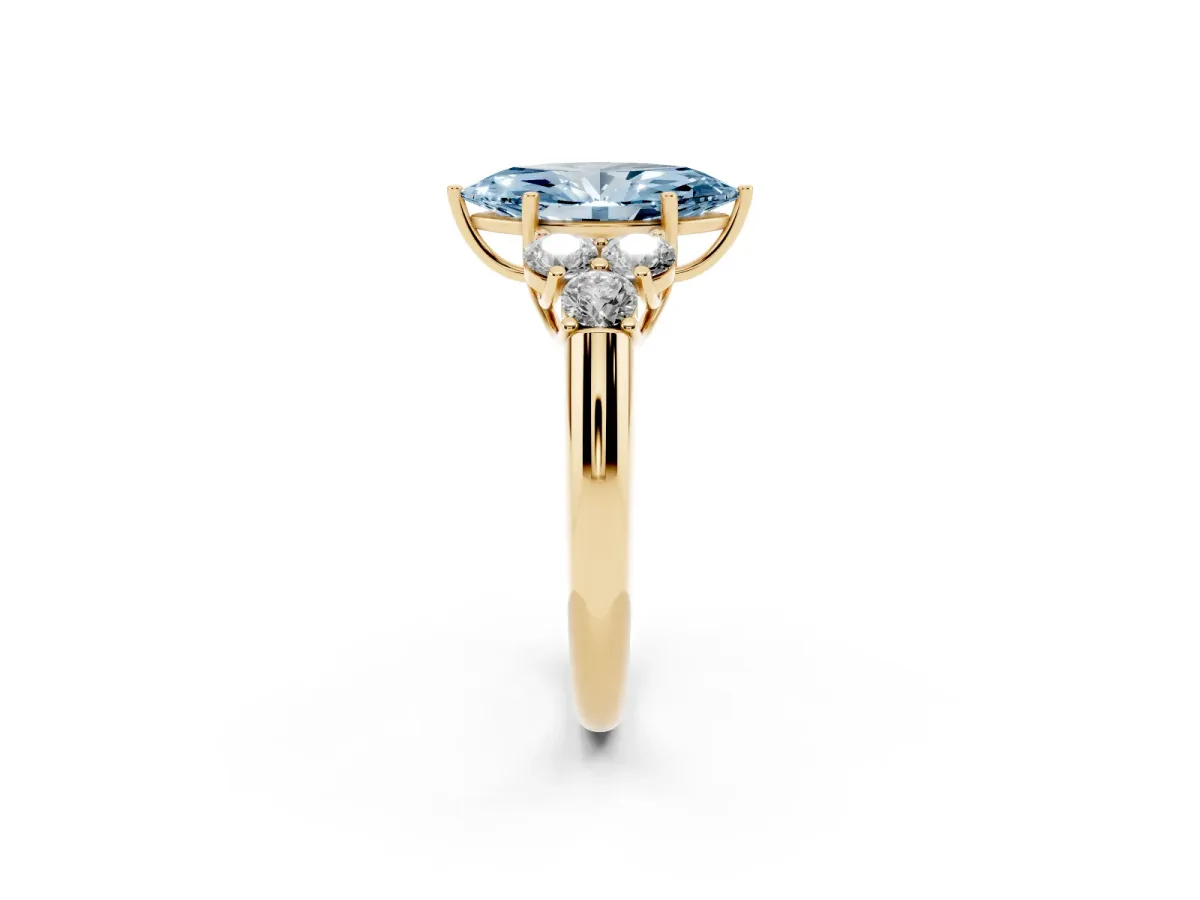 Fancy Blue Marquise Cut Cut Diamond Cluster Ring with Round Accent Stones and Prong Setting on a Classic Band Yellow gold