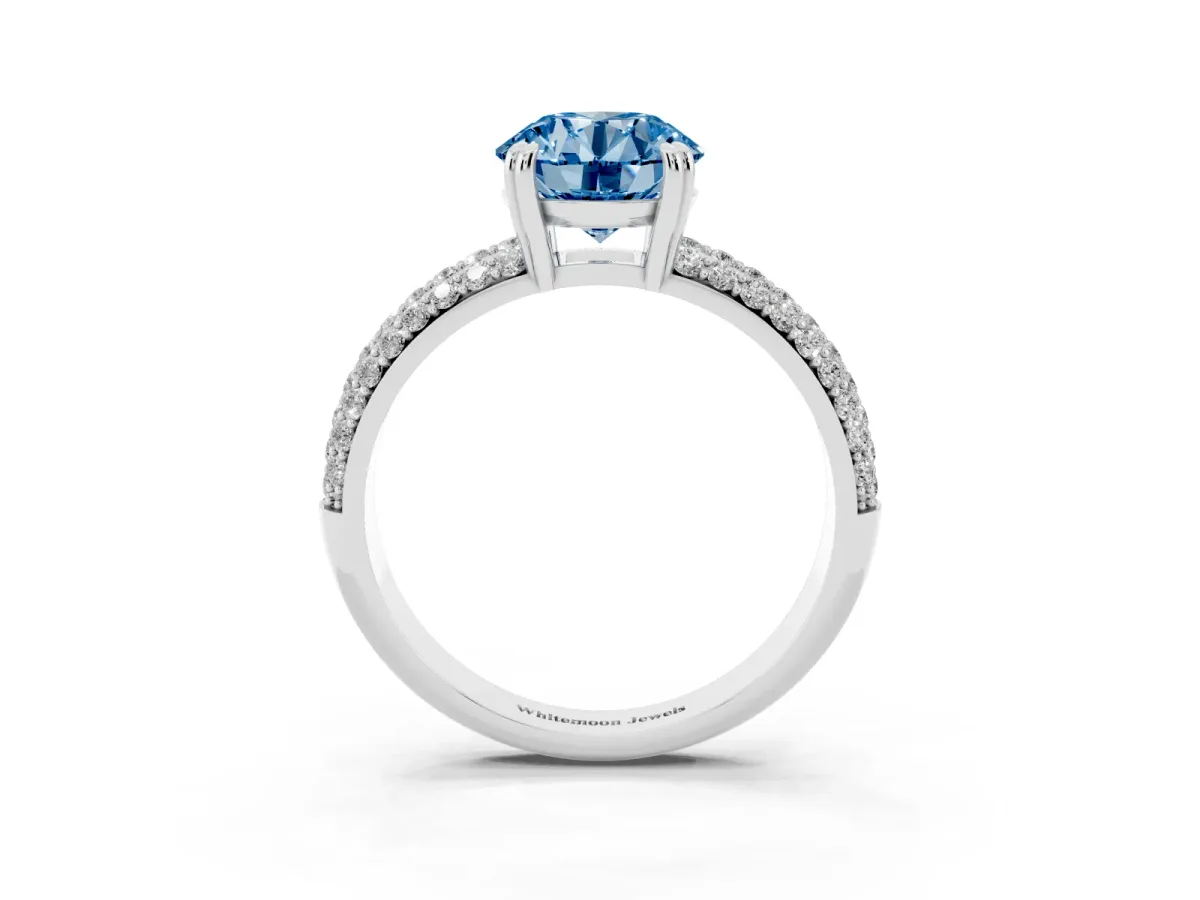 Fancy Blue Round Cut Diamond Solitaire Ring with Multi-Row Round Pavé Band and Prong Setting Silver