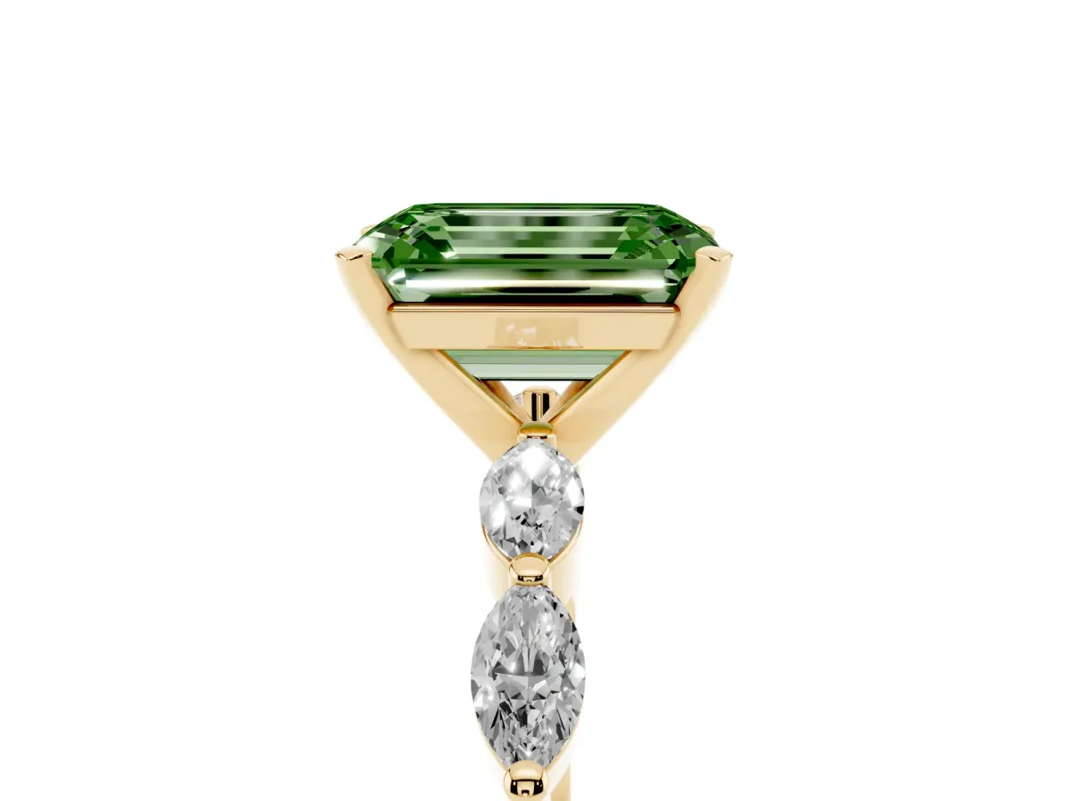 Fancy Green Emerald Cut Diamond Ring with Marquise Side Stones and Prong Setting Yellow gold