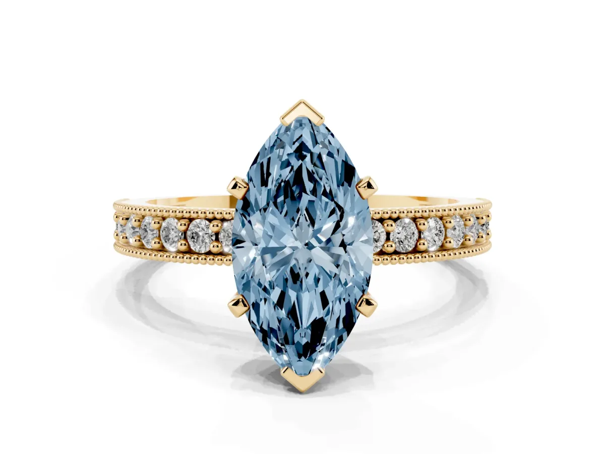 Fancy Blue Marquise Cut Diamond Milgrain Pavé Engagement Ring with Four-Prong Setting Yellow gold