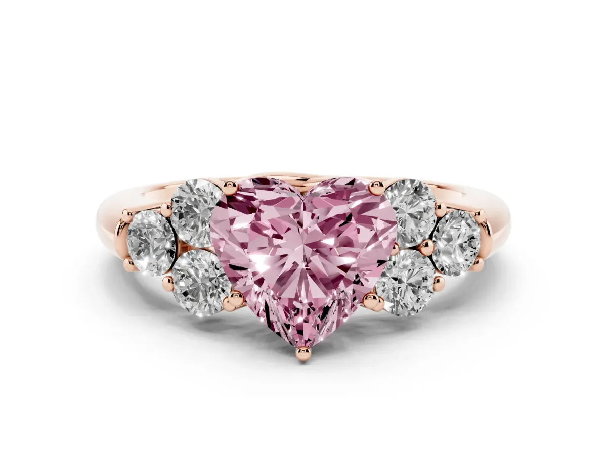 Fancy Pink Heart Cut Cut Diamond Cluster Ring with Round Accent Stones and Prong Setting on a Classic Band Rose gold