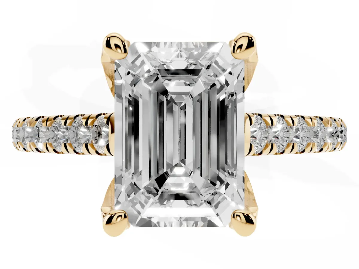 Emerald Cut Brilliant Diamond Solitaire with Pavé Band and Four-Prong Setting Yellow gold