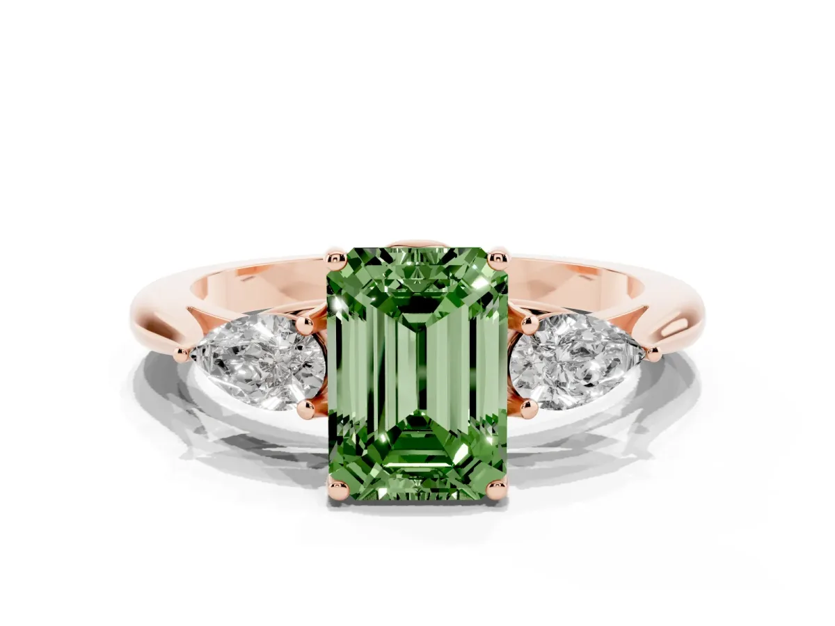 Fancy Green Three-Stone Emerald Cut Diamond Ring with Pear Side Stones in Four-Prong Setting Rose gold