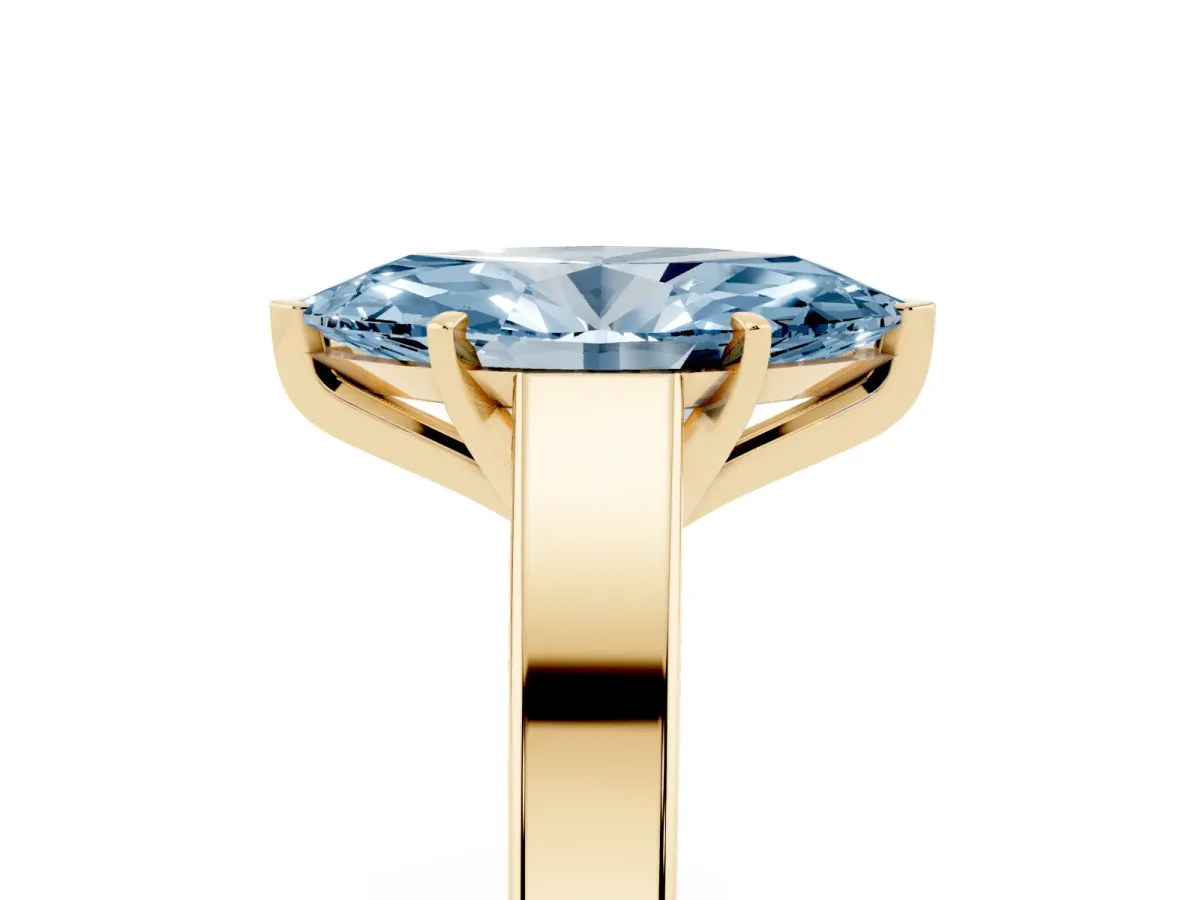 Fancy Blue Marquise Cut Solitaire Engagement Ring with Four-Prong Setting and Tapered Band Yellow gold