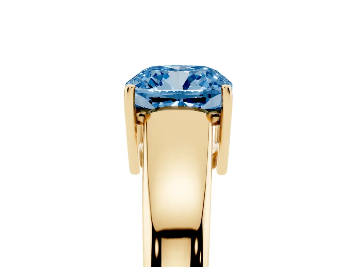 Fancy Blue Cushion Cut Solitaire Diamond Ring with Tapered Band and Four-Prong Setting Yellow gold