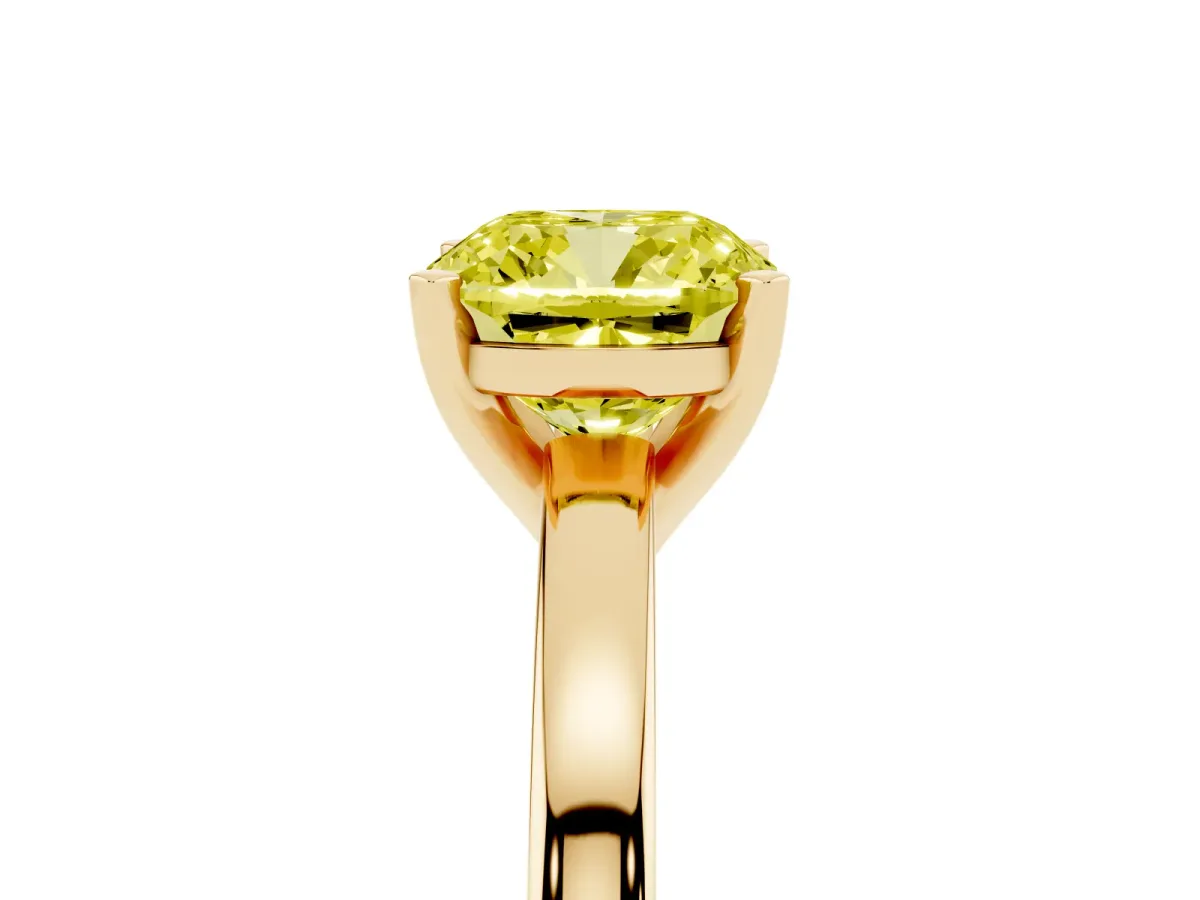 Fancy Yellow Cushion Cut Solitaire Diamond Engagement Ring with Four-Prong Setting on a Classic Band Yellow gold