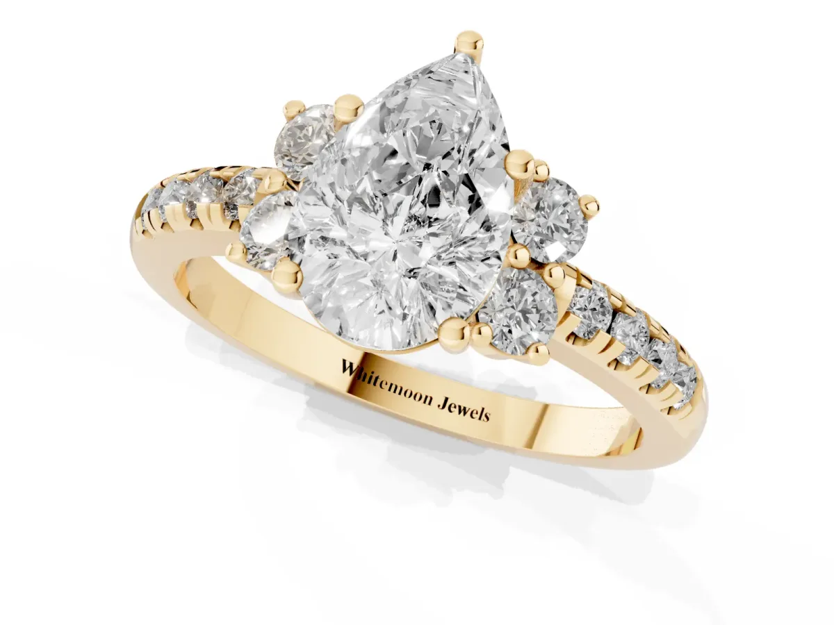 Pear Cut Diamond Three-Stone Pave Band with Four-Prong Setting Yellow gold