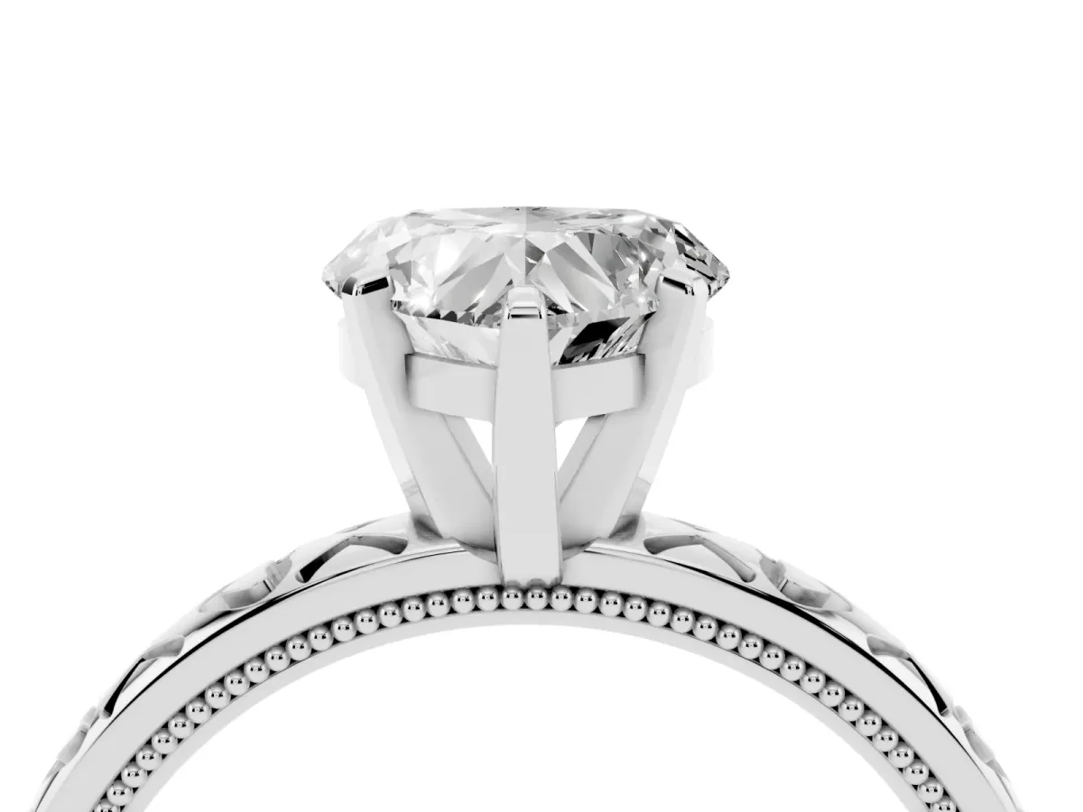 Heart Cut Solitaire Diamond Engagement Ring with XO Engraved Band and Four-Prong Setting Platinum