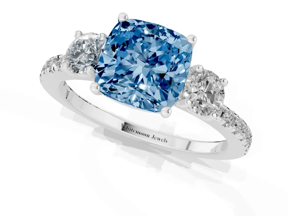 Fancy Blue Three-Stone Cushion Cut Cut Diamond Pavé Band with Prong Setting Platinum
