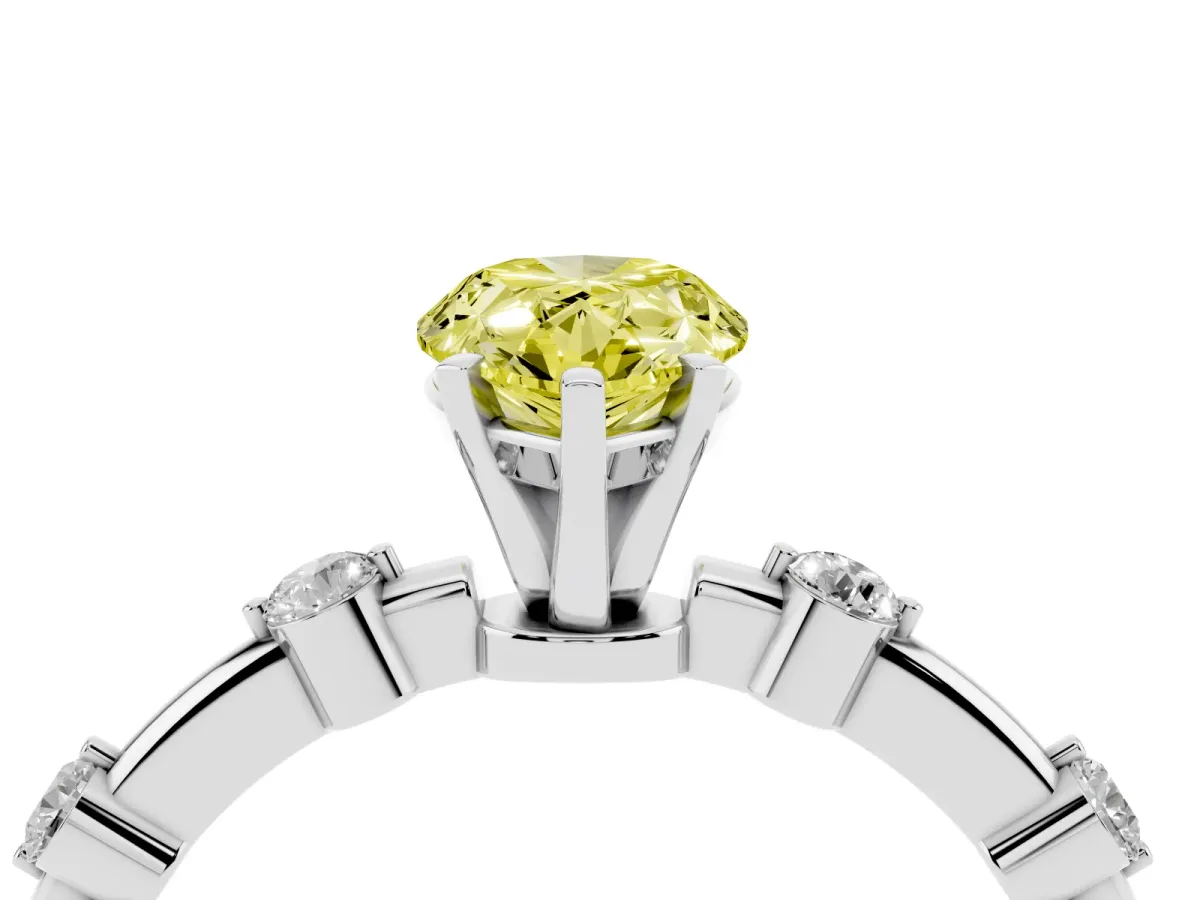 Fancy Yellow Pear Cut Solitaire Diamond Ring with Bezel Set Side Stones and Prong Setting Platinum