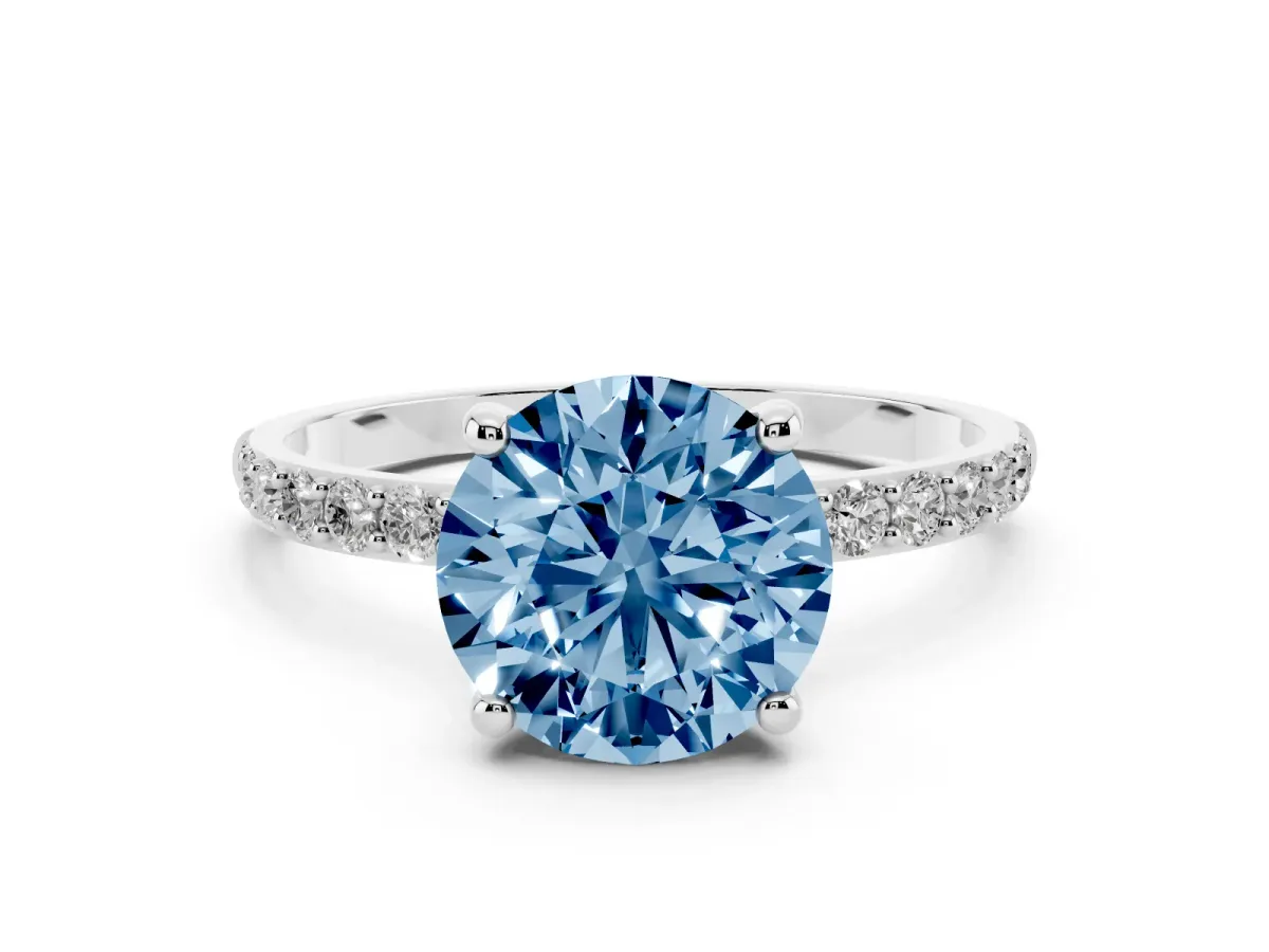 Fancy Blue Round Cut Diamond Solitaire Ring with Round Pavé Band and Prong Setting Silver