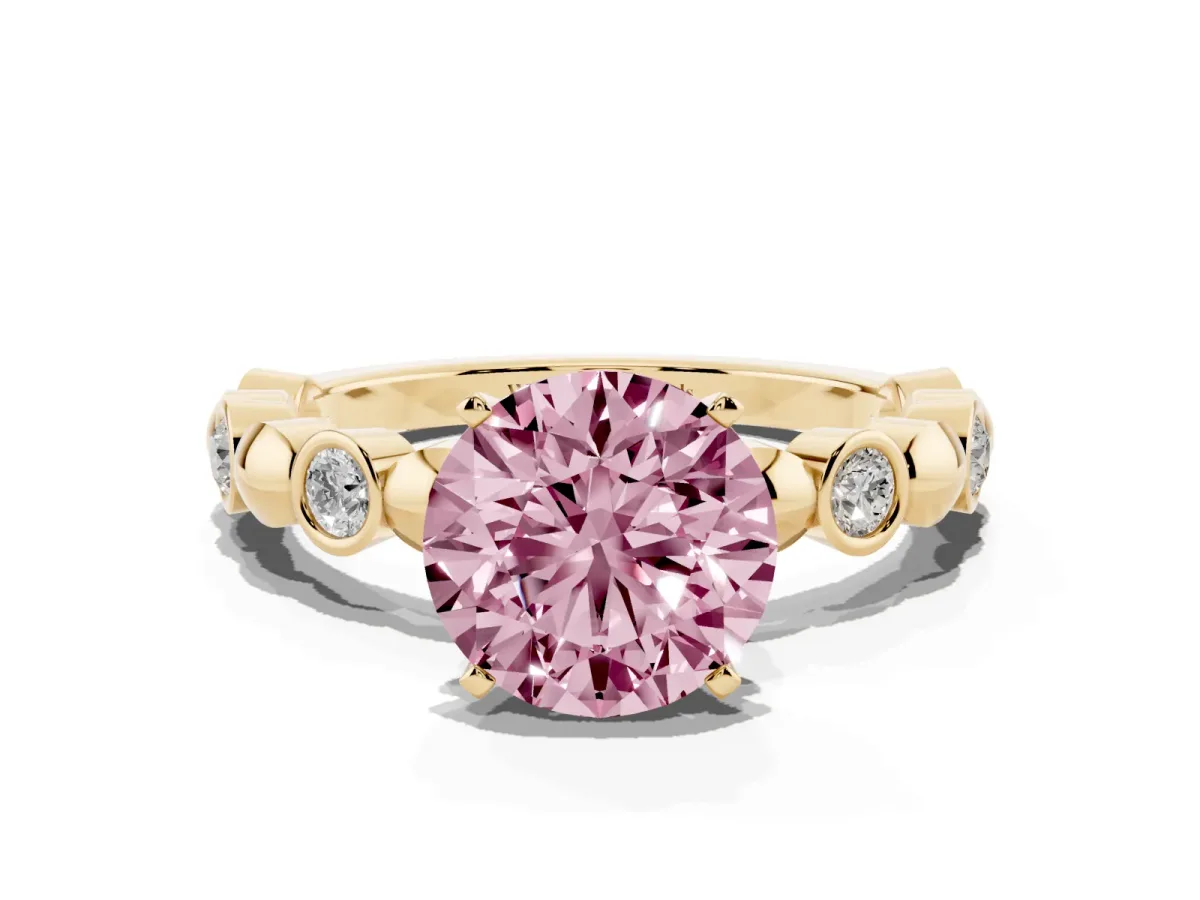 Fancy Pink Round Cut Solitaire Bezel-Set Diamond Ring with Beaded Band and Four-Prong Setting Yellow gold
