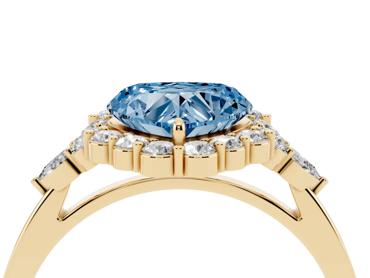 Fancy Blue Heart Cut Diamond Halo Ring with Pear Side Stones and Prong Setting Yellow gold