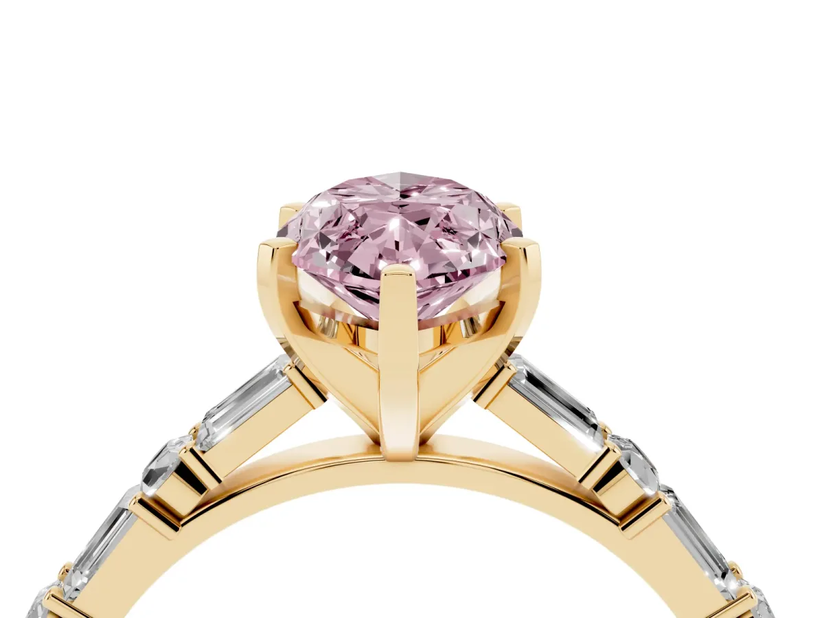 Fancy Pink Marquise Cut Diamond Solitaire with Side Baguettes and Channel Set Band Yellow gold