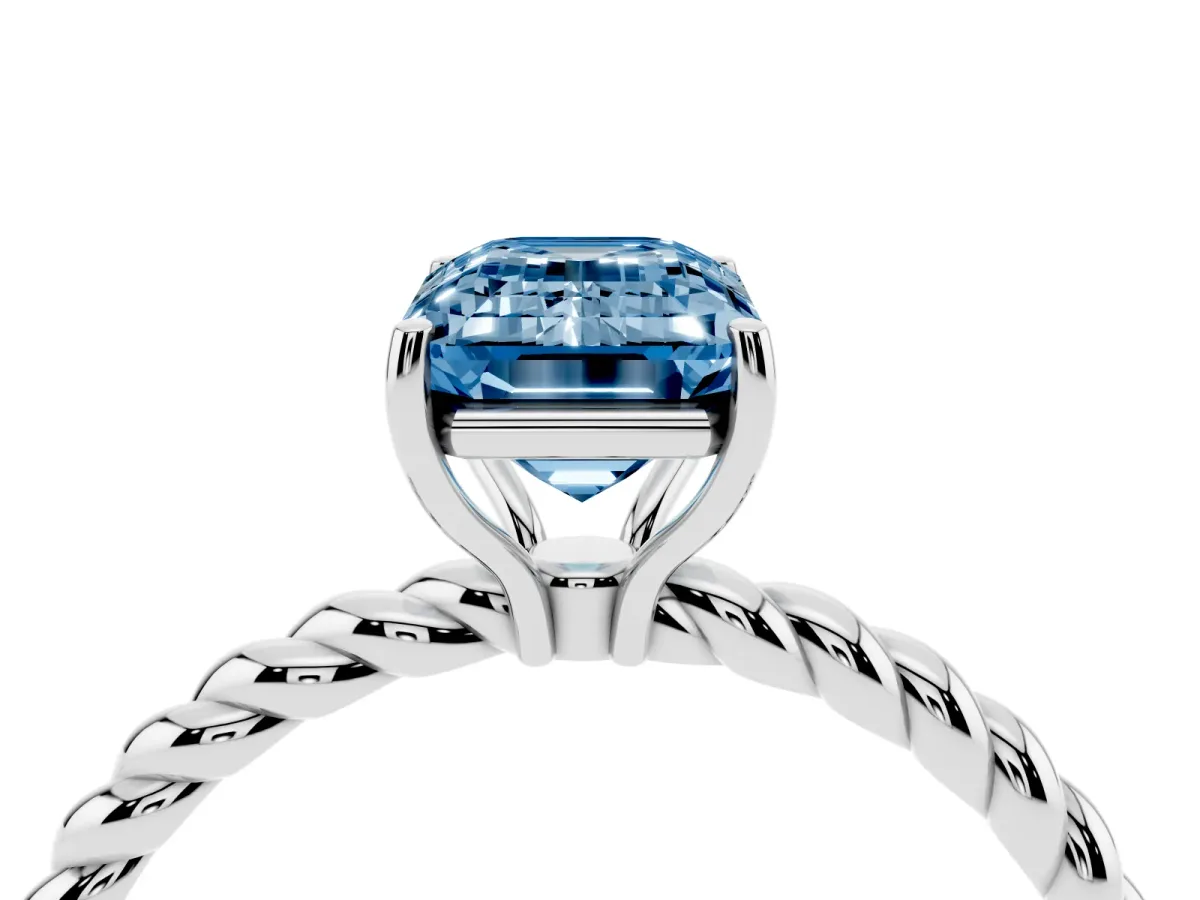 Fancy Blue Emerald Cut Solitaire Twist Band Ring with Four-Prong Setting Platinum