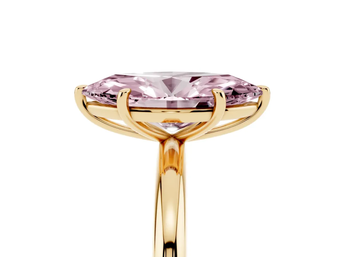 Fancy Pink Oval Cut Solitaire Diamond Ring with Four-Prong Setting on a Plain Band Yellow gold
