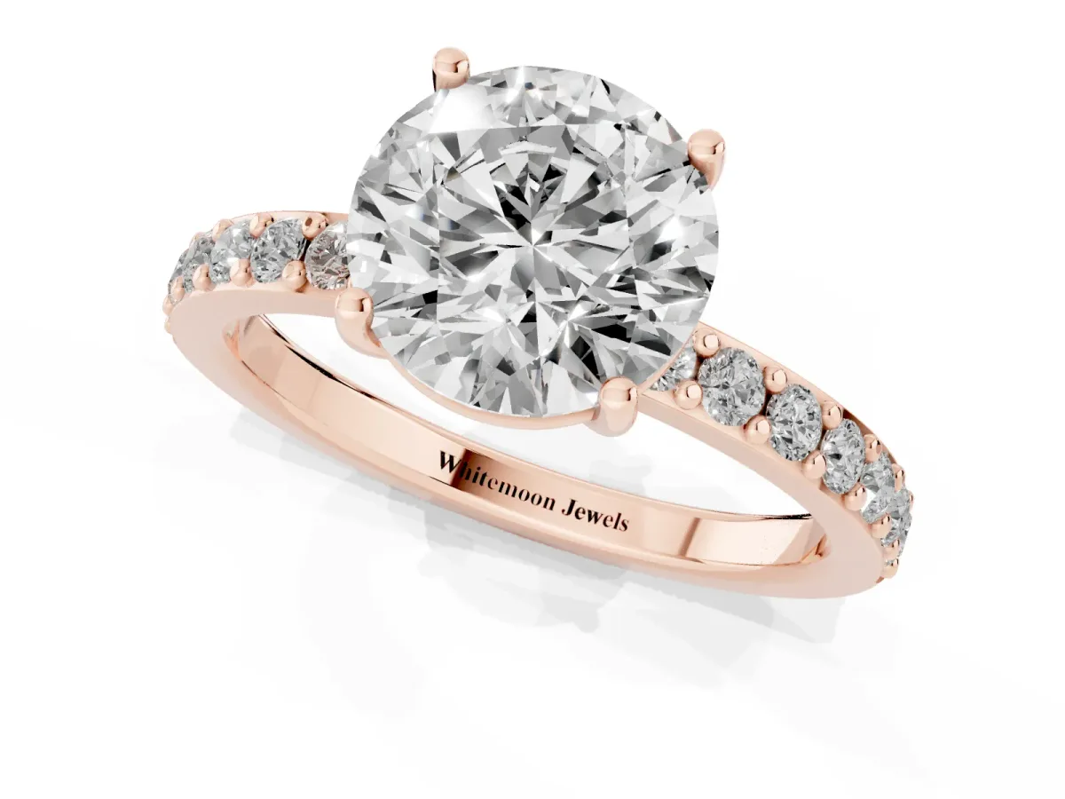 Round Cut Cut Diamond Solitaire with Pave Band and Four-Prong Setting Rose gold
