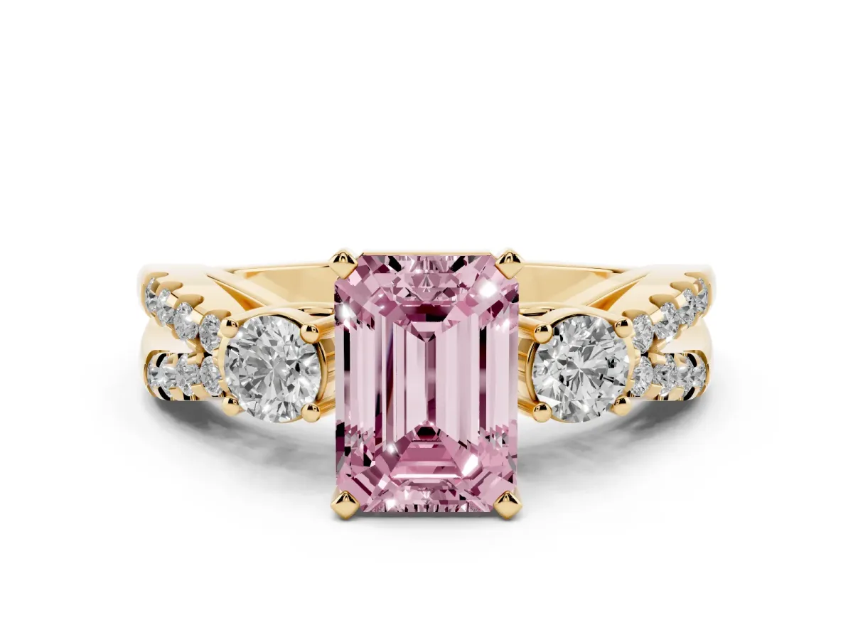 Fancy Pink Emerald Cut Diamond Three-Stone Ring with Pavé Split Shank and Four-Prong Setting Yellow gold