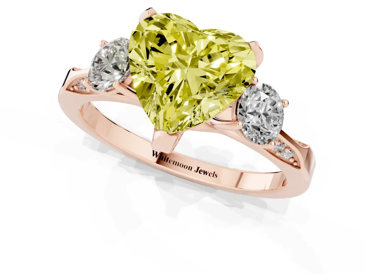 Fancy Yellow Heart Cut Brilliant Three-Stone Diamond Ring with Pavé Band and Four-Prong Setting Rose gold