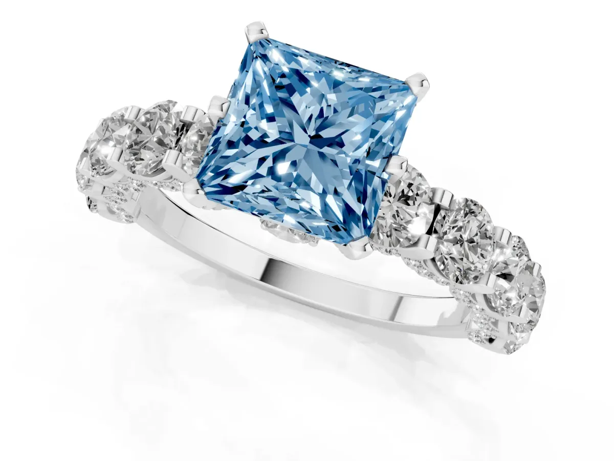 Fancy Blue Princess Cut Diamond Side Stone Engagement Ring with Four-Prong Setting Platinum