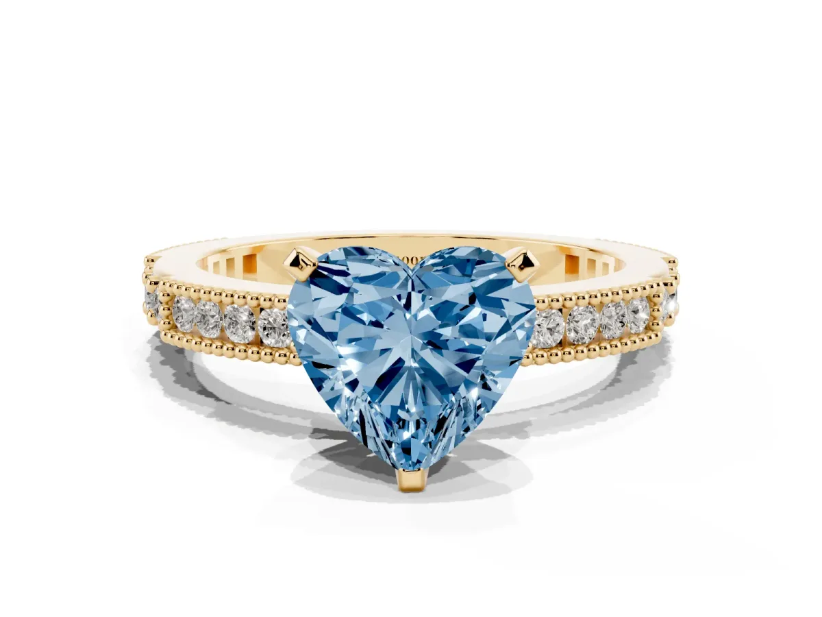 Fancy Blue Heart Cut Solitaire with Pavé Band and Four-Prong Setting Yellow gold