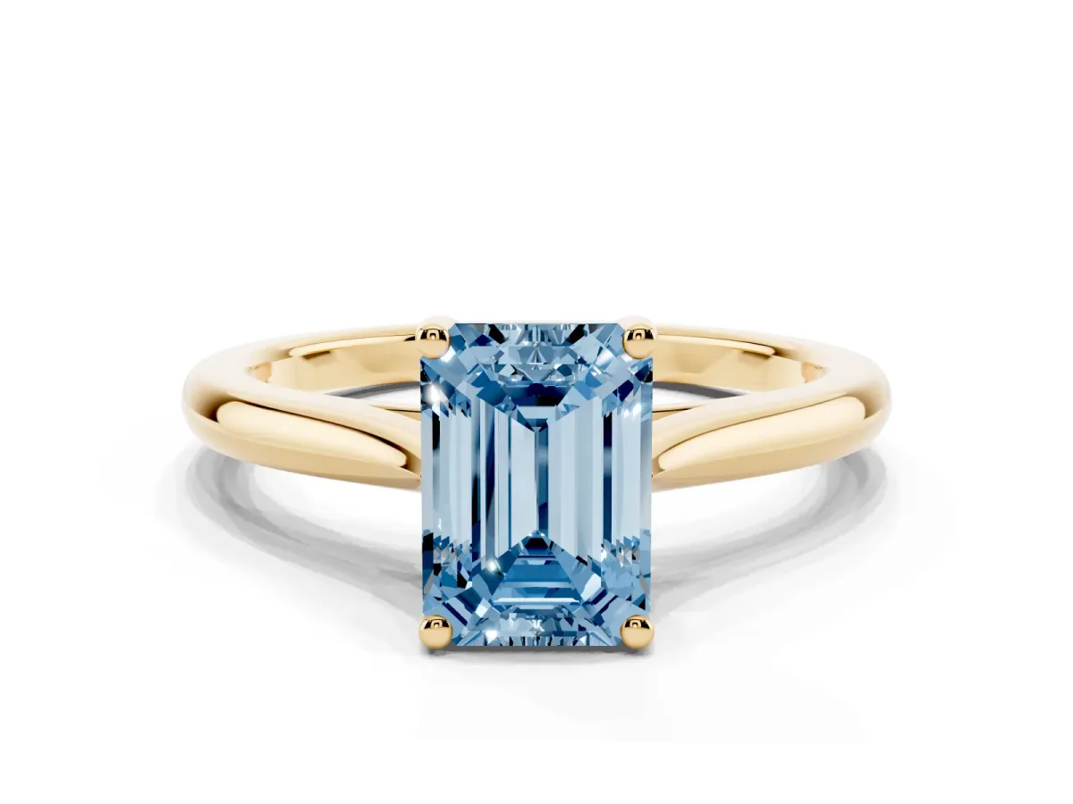 Fancy Blue Emerald Cut Cut Solitaire Ring with Cathedral Band and Four-Prong Setting Yellow gold
