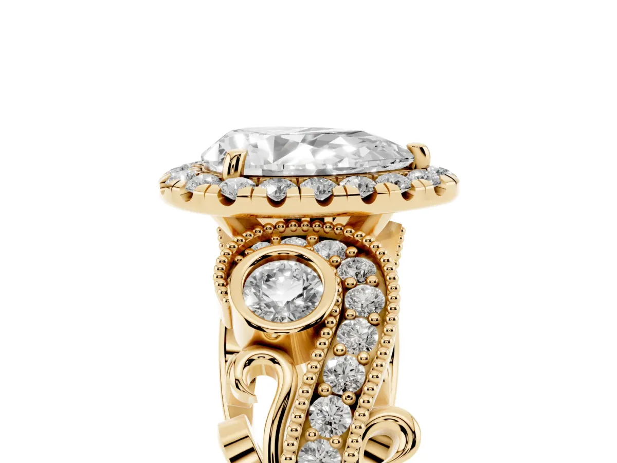 Pear Cut Halo Diamond Ring with Milgrain and Bezel Accents on a Split Shank Band Yellow gold