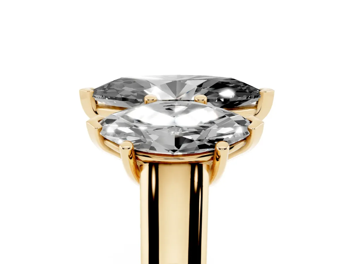 Fancy Black Marquise Cut Three-Stone Diamond Ring with Prong Setting on a Classic Band Yellow gold