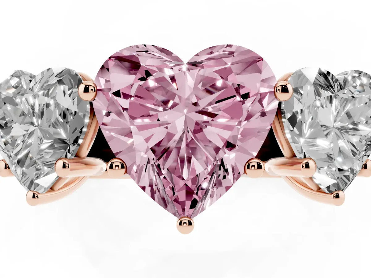 Fancy Pink Heart Cut Three-Stone Diamond Ring with Prong Setting on a Classic Band Rose gold
