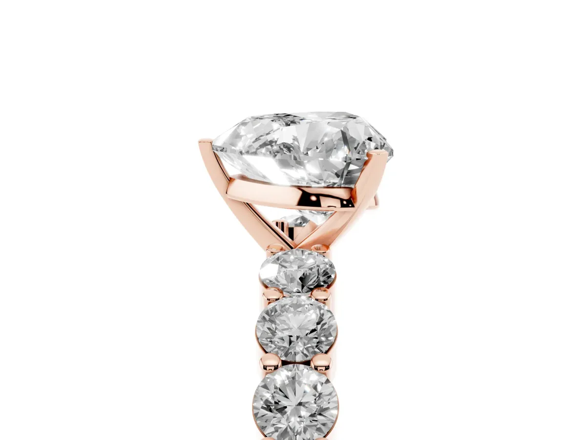 Heart Cut Diamond Solitaire Ring with Shared Prong Round Side Stones Rose gold