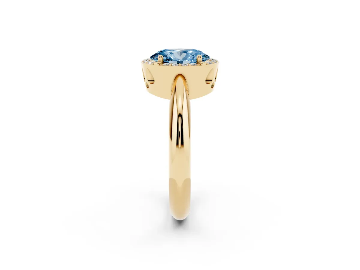 Fancy Blue Oval Cut Cut Diamond Halo Engagement Ring with Split Shank and Four-Prong Setting Yellow gold