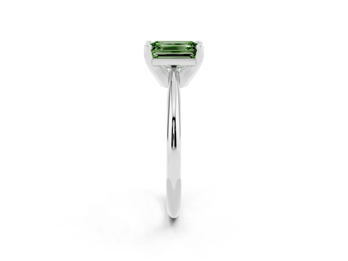 Fancy Green Emerald Cut Cut Solitaire Ring with Four-Prong Setting on a Classic Band Platinum