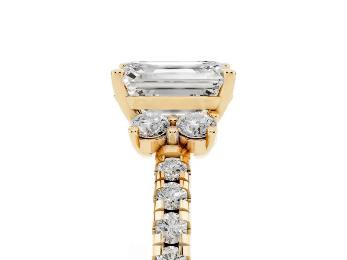 Emerald Cut Diamond Three-Stone Pave Band with Four-Prong Setting Yellow gold