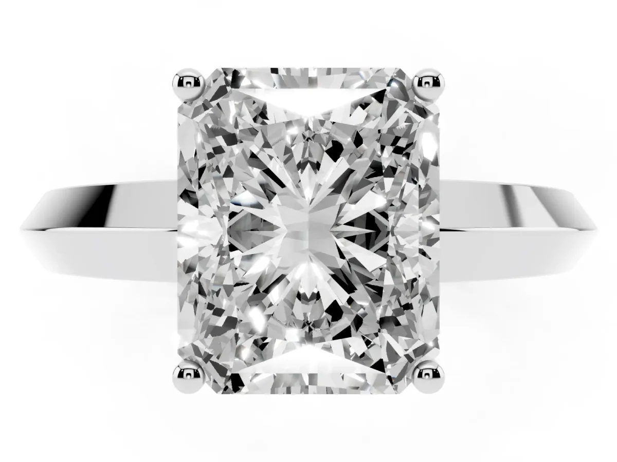 Radiant Cut Cut Solitaire Engagement Ring with Flat Band and Four-Prong Setting Silver