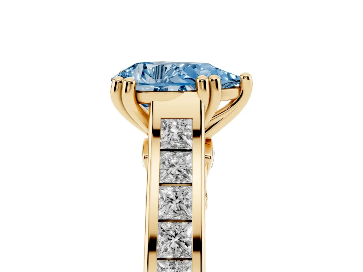 Fancy Blue Pear Cut Cut Channel Set Solitaire Engagement Ring with Prong Setting Yellow gold