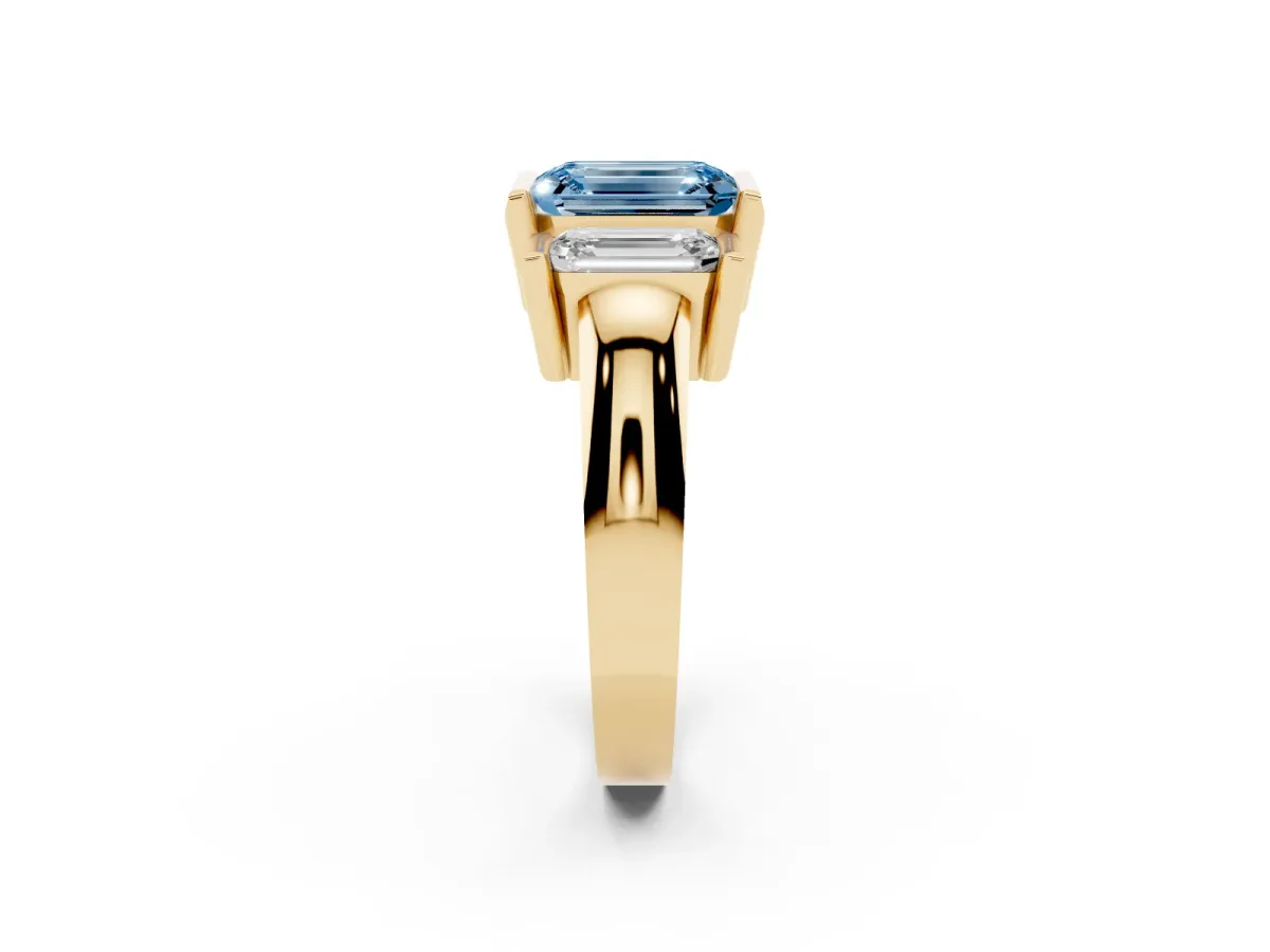 Fancy Blue Three Stone Emerald Cut Cut Channel Set Diamond Ring Yellow gold