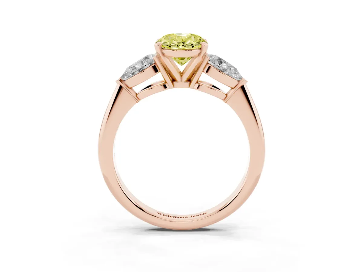 Fancy Yellow Three-Stone Oval Cut Diamond Ring with Pear Side Stones and Four-Prong Setting Rose gold
