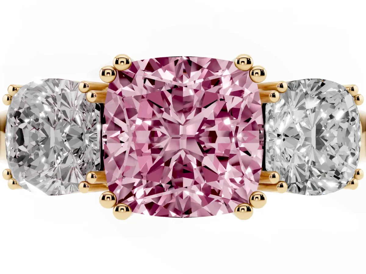 Fancy Pink Three-Stone Cushion Cut Cut Diamond Ring with Channel Set Band and Four-Prong Setting Yellow gold