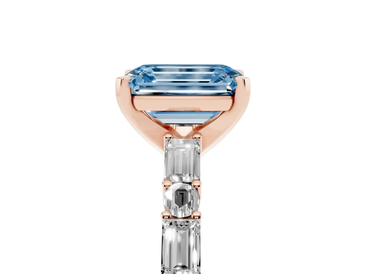 Fancy Blue Emerald Cut Diamond Solitaire with Side Baguettes and Channel Set Band Rose gold