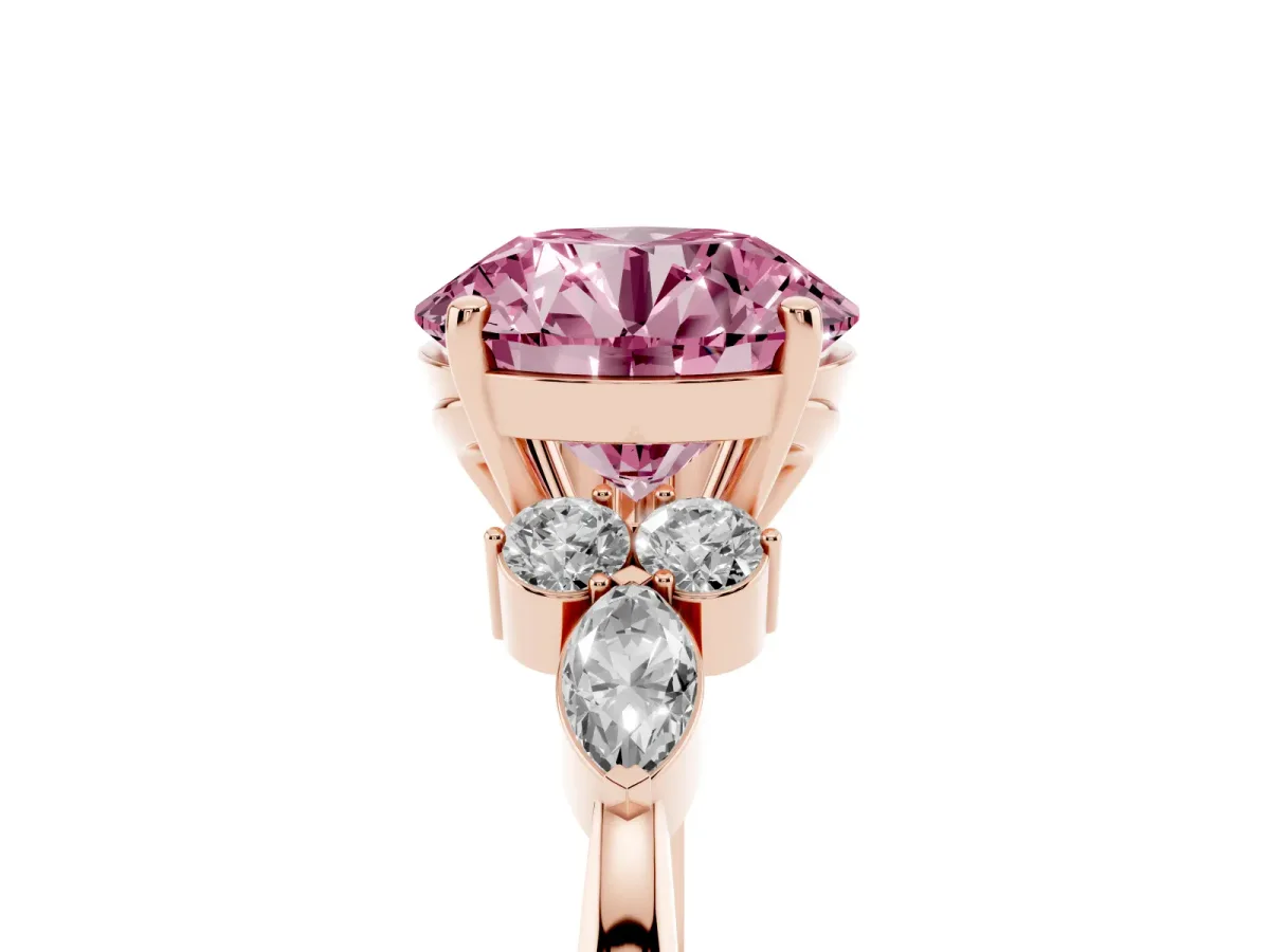 Fancy Pink Round Cut Brilliant Diamond Solitaire Ring with Pear Side Stones and Four-Prong Setting Rose gold