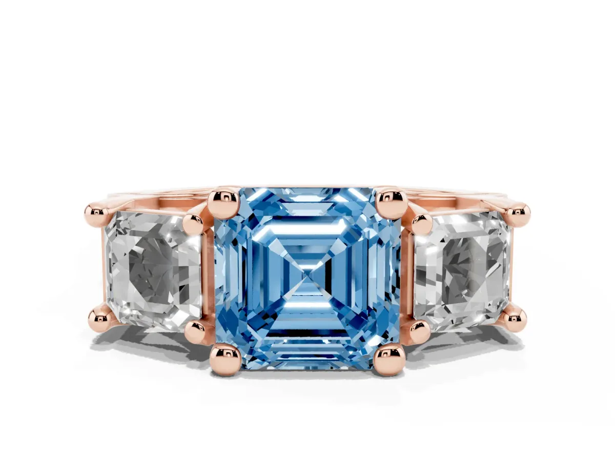 Fancy Blue Asscher Cut Diamond Three-Stone Ring with Channel Set Band and Four-Prong Setting Rose gold